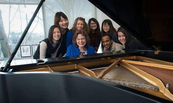Director of the Dewberry School of Music and piano professor, Dr. Linda Monson, with some of her international piano students.